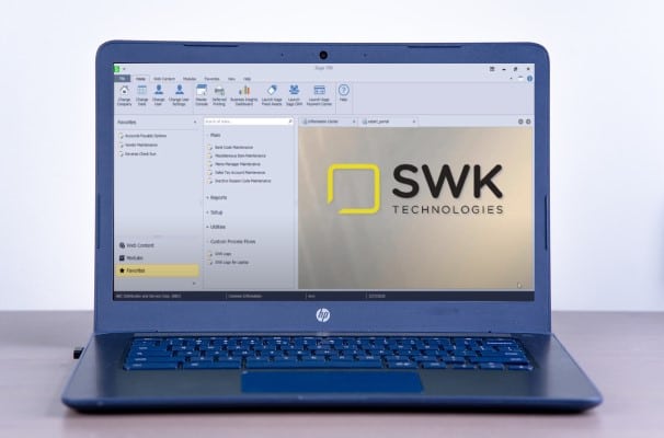 A Sage 100 screen on a laptop displaying the SWK Technologies, a trusted Sage ERP cloud hosting provider.