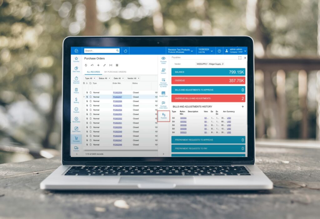 A laptop displaying purchase order reports in Acumatica with a side panel showing vendor payables and balance information against a blurred outdoor background.